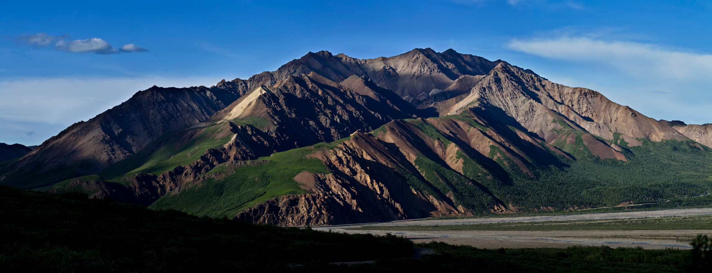 Denali and the Alaska Range rising above the Outer Range.