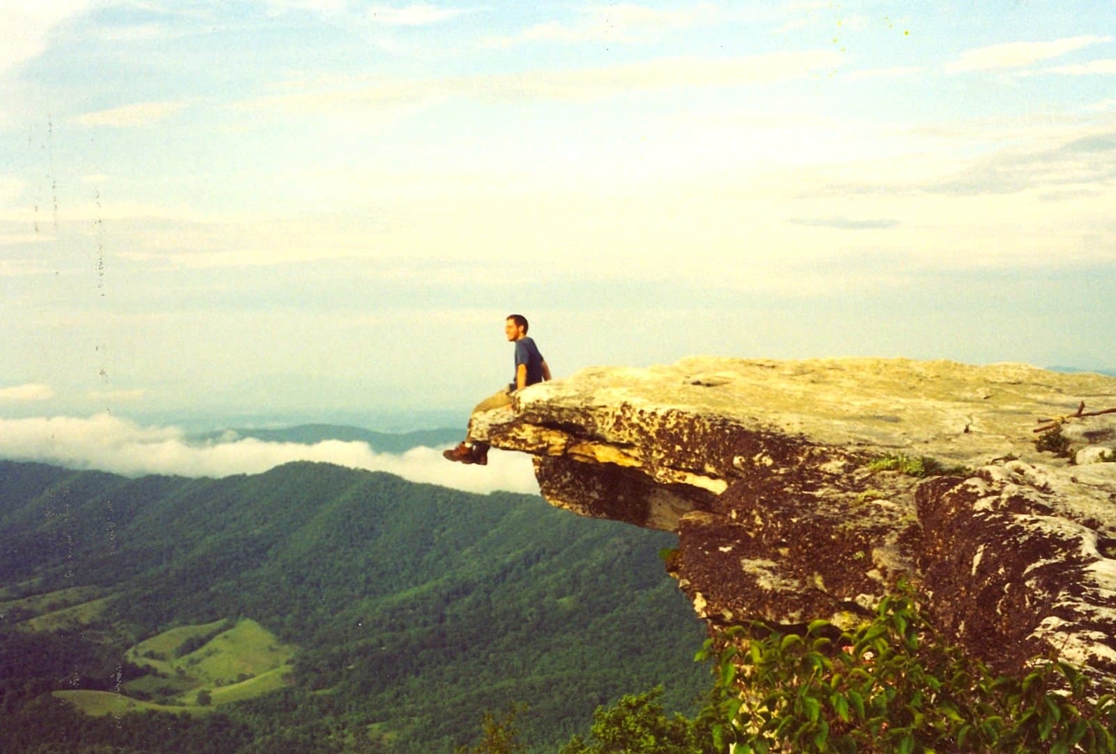 A hiker on the McAfee Knob ledge, Virginia