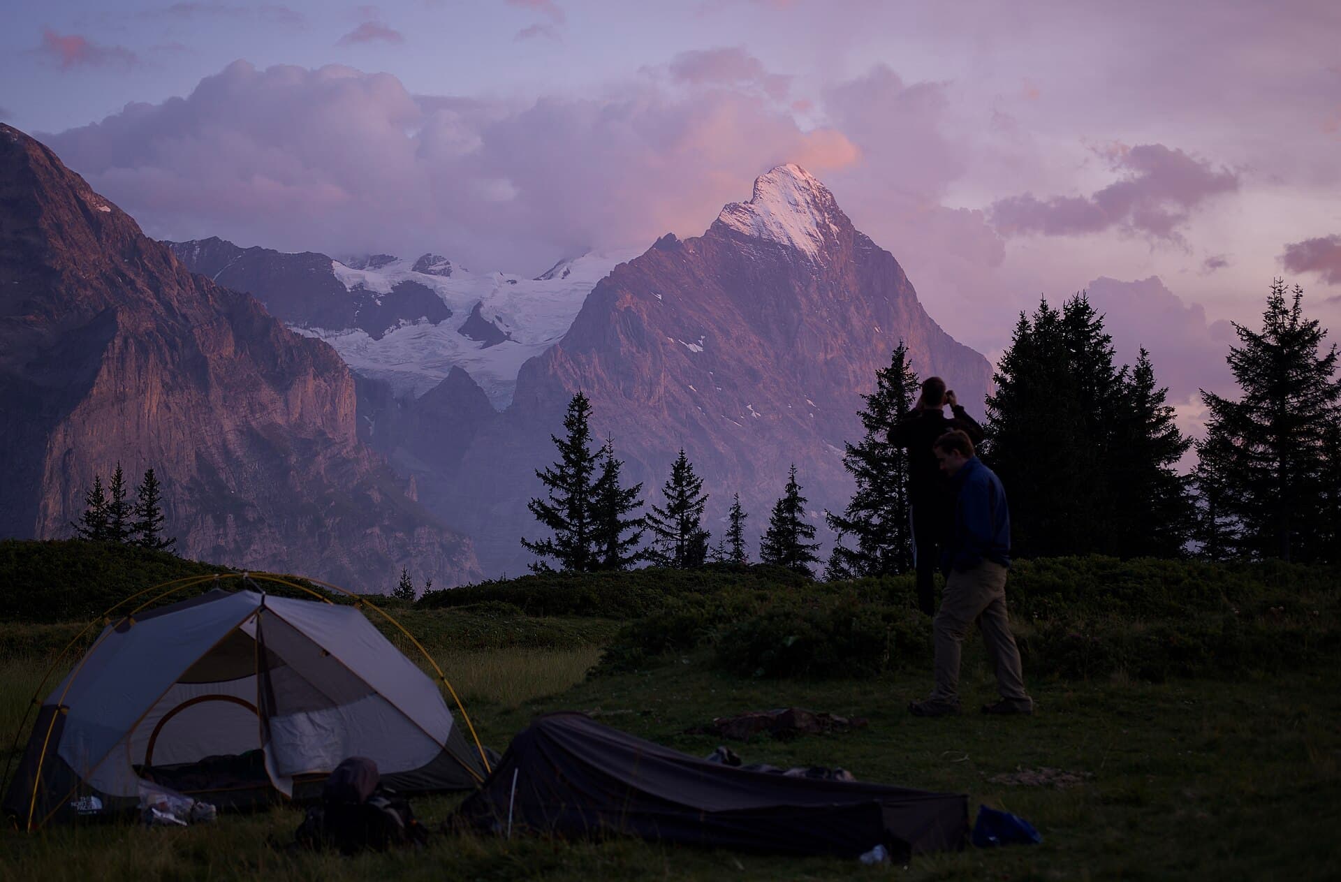 A camp at dusk below the Eiger